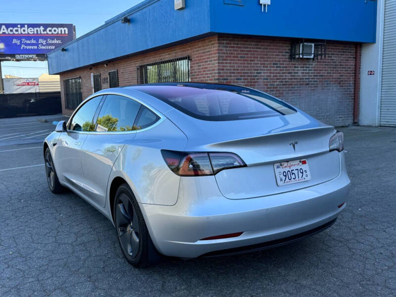 tesla model 3 2018 5YJ3E1EA5JF007034 image tesla model 3 2018 5YJ3E1EA5JF007034 image
